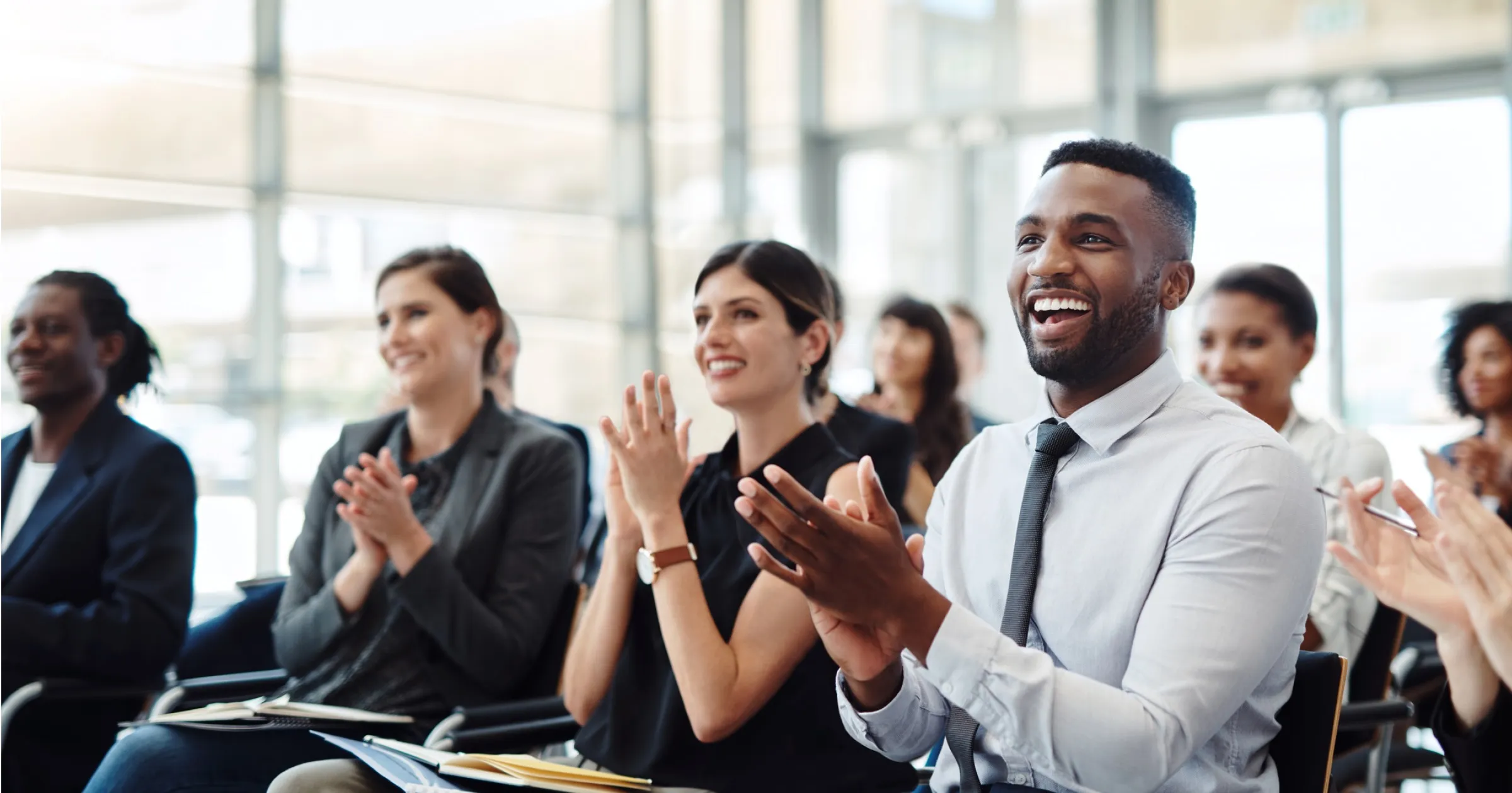Business professionals attending a cloud print management training on how cloud-native printing helps enterprises simplify print operations, reduce IT infrastructure overhead, and support scalable hybrid work strategies.