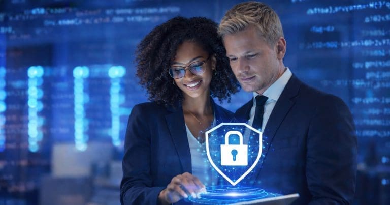 IT professionals reviewing secure printing controls, representing Windows Protected Print readiness and modern enterprise print security.