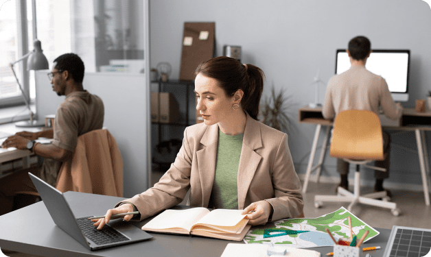 People working at desks in a modern office