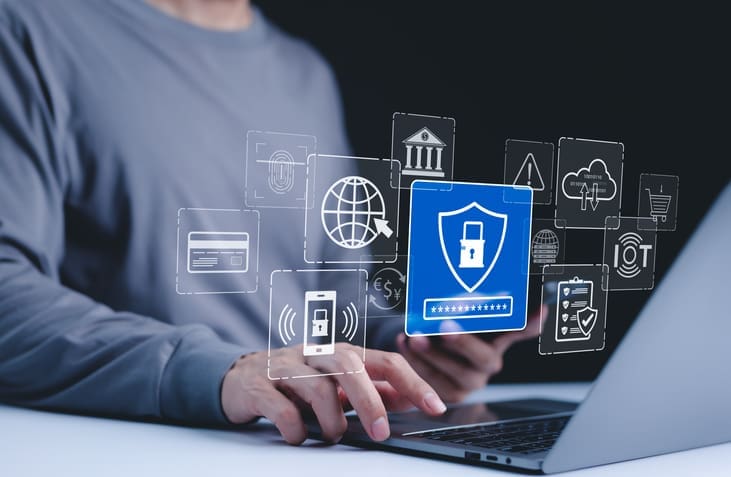 Security interface on laptop illustrating secure release printing, logging, and policy controls to reduce last-mile print data loss